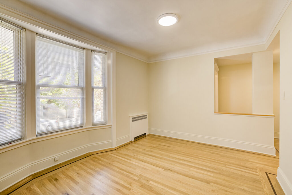 Empty interior living space of Mark Hopkins apartment